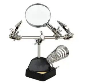 Magnifying soldering stand with adjustable clips and a built-in magnifier for precise electronic work.