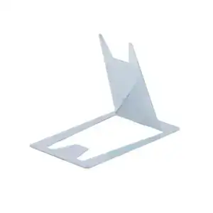 Portable metal laptop riser for comfortable typing and viewing angles.