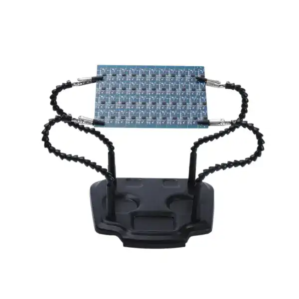 Soldering helping hand with adjustable arms, magnifier, and circuit board for precise electronics work. Ideal for soldering, repair, and DIY electronics projects.