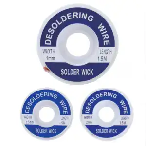 Close-up of solder wick desoldering wire spools with different widths (1mm and 2mm) and a length of 1.5 meters, used for removing solder from electronic components.