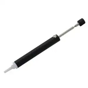 Solder sucker gun for electronic repair and solder removal. Precision tool with a rubber grip and metal nozzle, ideal for cleaning solder joints and reworking circuit boards.