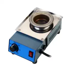 Compact solder pot used for precise soldering and electronic component repair, featuring adjustable temperature control and durable construction for professional use.