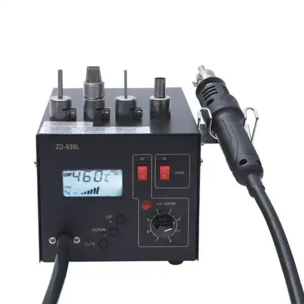 Portable hot air rework station for soldering and desoldering electronic components. Features adjustable temperature control, digital display, and multiple nozzles for precise heat application. Ideal.