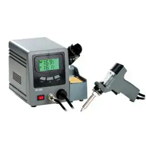Desoldering station with digital display, adjustable temperature, and soldering iron for electronic repair.