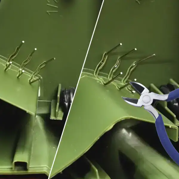 Close-up of a plastic welding gun with metal pins and pliers for plastic welding repair.